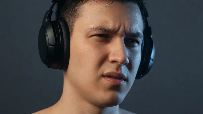 Focused player portrait at desk
